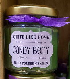 Candy Berry scented 4 oz. jar candle with gold lid, and organza ribbon.