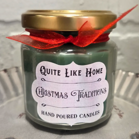 Christmas Traditions scented 4 oz. jar candle with gold lid, & organza ribbon.
