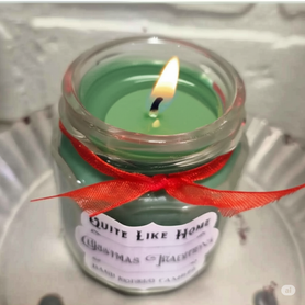 Christmas Traditions scented 4 oz. jar candle with gold lid, & organza ribbon.