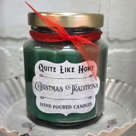 Christmas Traditions scented 6.5 oz. jar candle with gold lid, & organza ribbon.