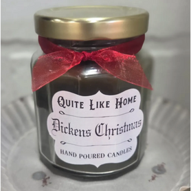 Dickens Christmas scented 6.5 oz. jar candle with gold lid, & organza ribbon.