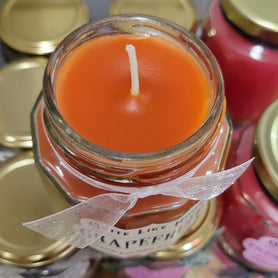 Grapefruit scented 4 oz. jar candle with gold lid and organza ribbon