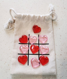 Travel Tic-Tac-Toe game in travel bag