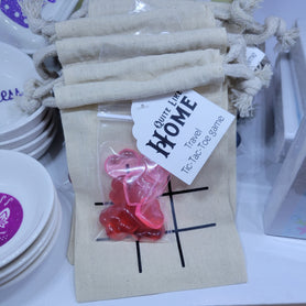 Travel Tic-Tac-Toe game in travel bag