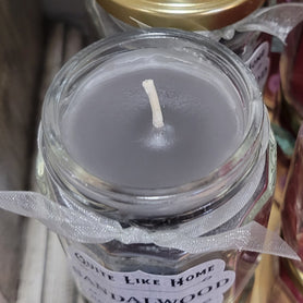 Sandalwood scented 4 oz. jar candle with gold lid, and organza ribbon