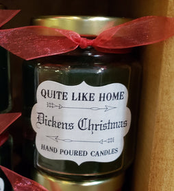 Dickens Christmas scented 6.5 oz. jar candle with gold lid, & organza ribbon.