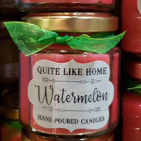 Watermelon scented 4 oz. jar candle with gold lid, and organza ribbon.