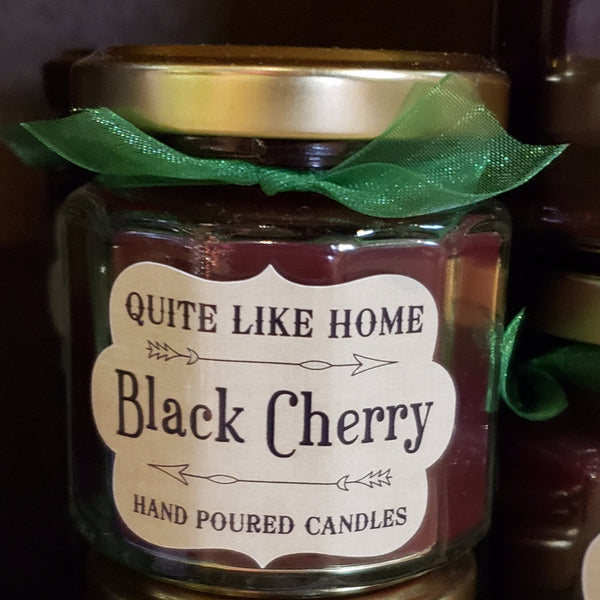 Black Cherry scented 4 oz. jar candle with gold lid, and organza ribbon.