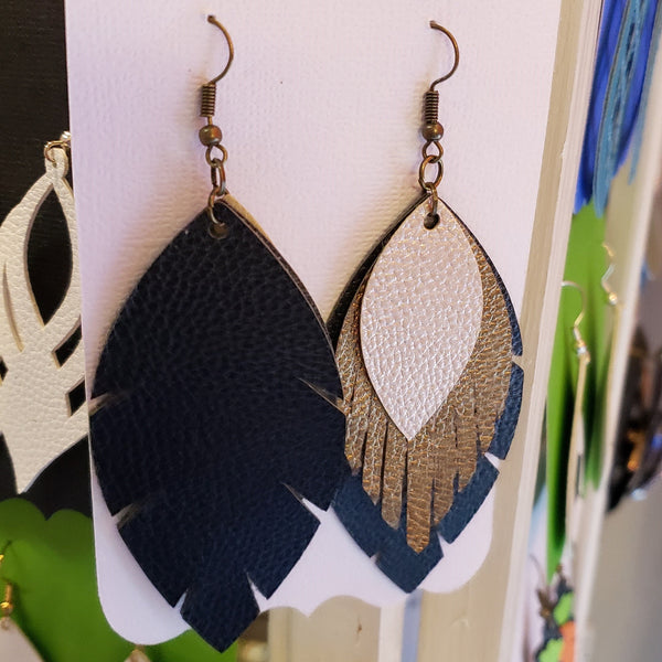 Triple stacked gold, bronze, and black varied leaf shaped faux leather earrings
